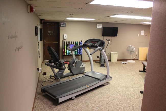 image001 Photo of treadmill and exercise equipment inside the physical therapy room at Pleasant View